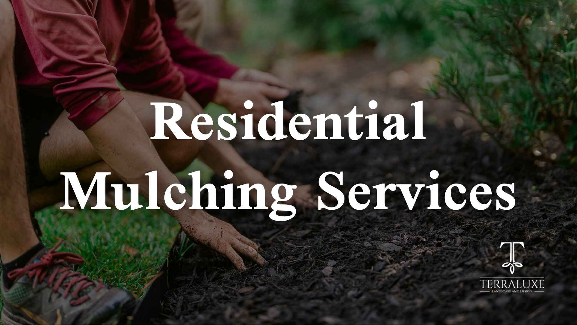 workers installing new mulch landscaping